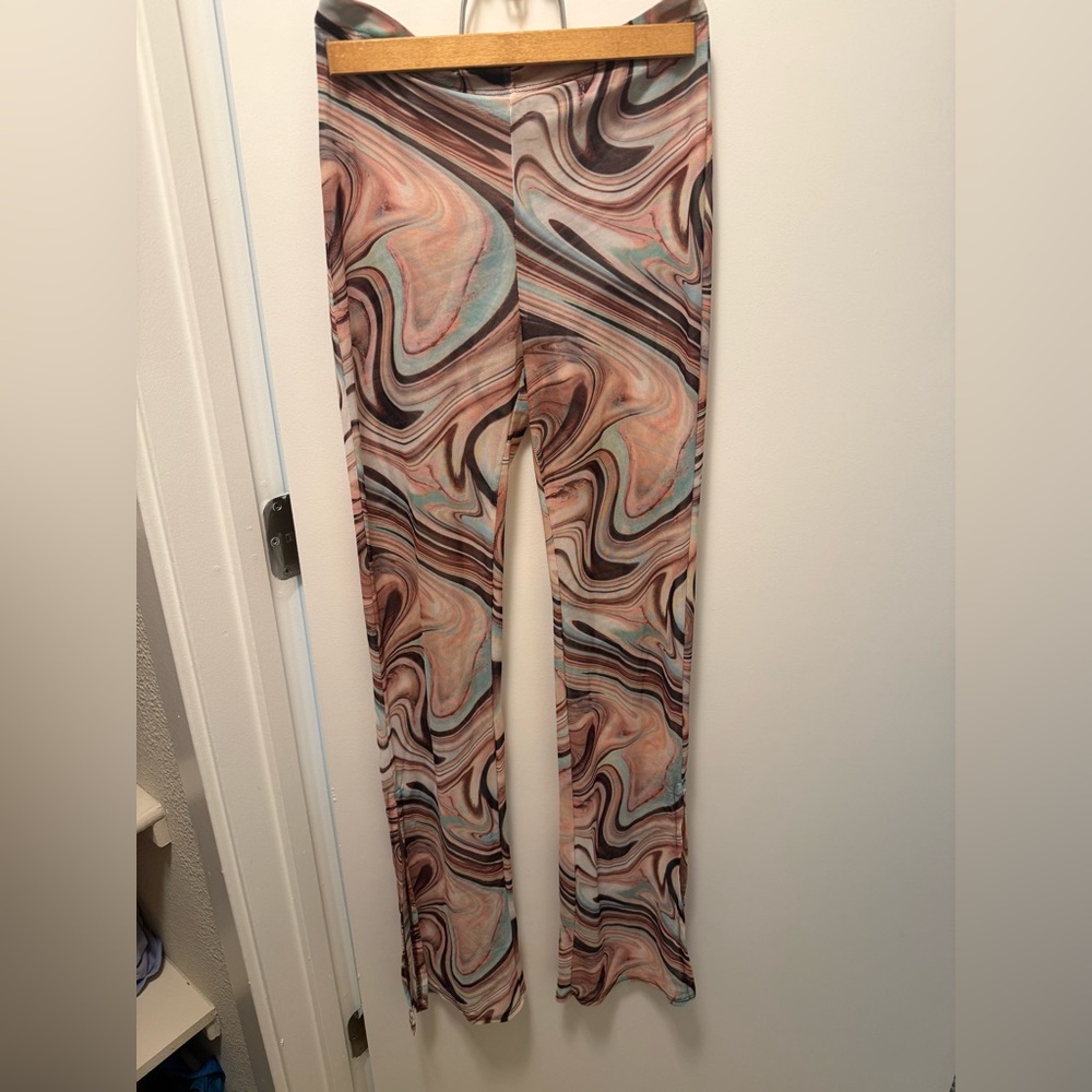Stretchy gauzy retro print pants for music festivals and clubbing
